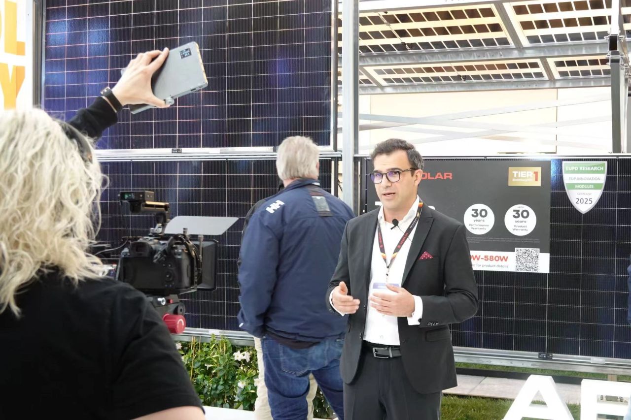 Dr. Hamed Hanifi at a photovoltaic conference or industry event